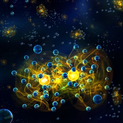 Potassium atoms (yellow) surrounded by lithium atoms (blue) form polarons that interact with each other.  Credit: IQOQI Innsbruck/Harald Ritsch